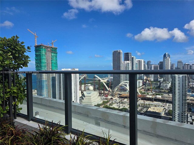 1600 NE 1st Ave Unit 3017, Miami, FL 33132 - balcony featuring a skyline view and a water view