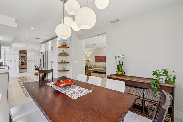 441 SW 27th Rd, Miami, FL 33129 - dining space featuring light tile patterned floors, recessed lighting, and built in features