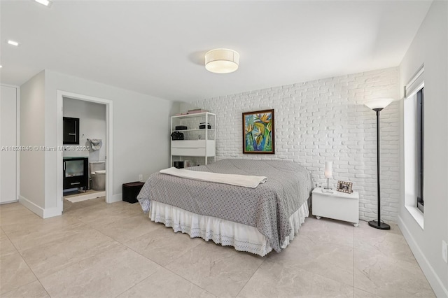 441 SW 27th Rd, Miami, FL 33129 - bedroom with brick wall and an accent wall