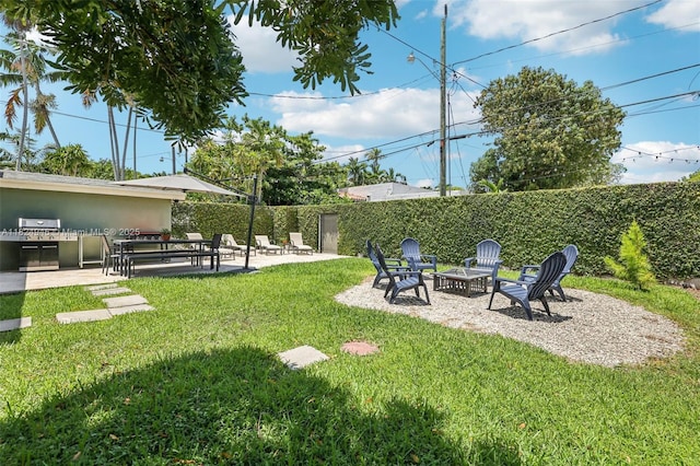 441 SW 27th Rd, Miami, FL 33129 - view of yard with a patio and a fire pit