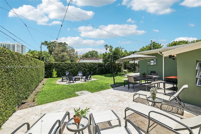 441 SW 27th Rd, Miami, FL 33129 - fenced backyard featuring an outdoor fire pit, a patio, and outdoor dining area