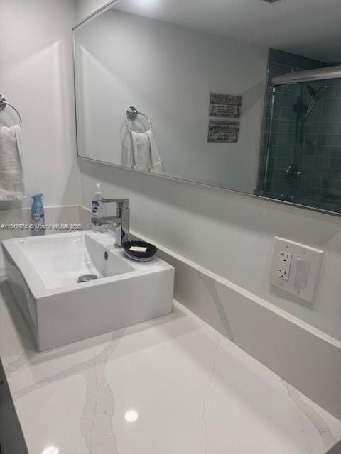 6039 Collins Ave Unit 1516, Miami Beach, FL 33140 - bathroom with tiled shower and vanity