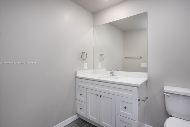 899 Brickell St SE, Palm Bay, FL 32909 - half bath featuring vanity and baseboards
