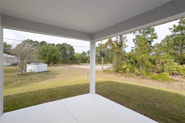 899 Brickell St SE, Palm Bay, FL 32909 - view of grassy yard with a patio