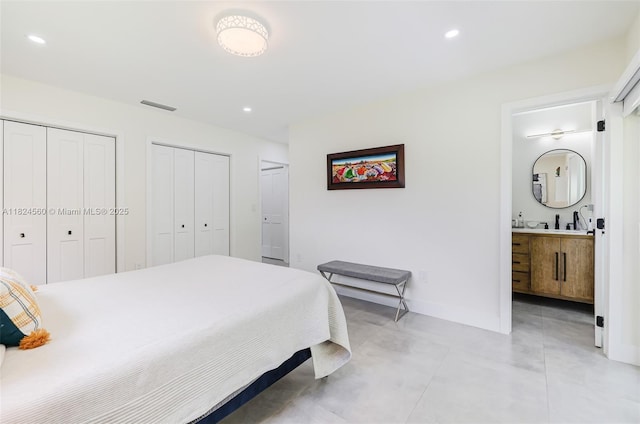 17460 SW 85th Ave, Palmetto Bay, FL 33157 - bedroom featuring two closets, recessed lighting, and ensuite bath