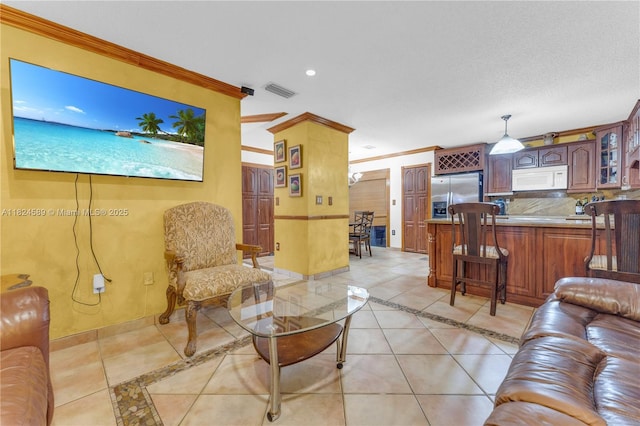 12350 NW 7th Trl, Miami, FL 33182 - living room with inlaid floor details, light tile patterned flooring, ornamental molding, and recessed lighting