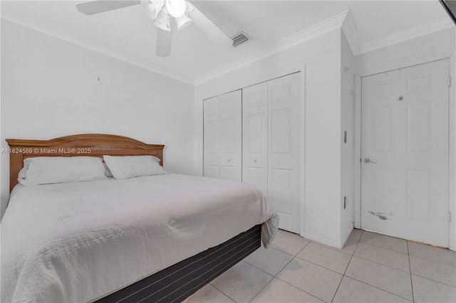 12350 NW 7th Trl, Miami, FL 33182 - bedroom with ornamental molding, light tile patterned floors, a closet, and a ceiling fan