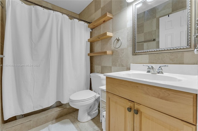 12350 NW 7th Trl, Miami, FL 33182 - bathroom with tile walls, vanity, tile patterned flooring, and a shower with curtain