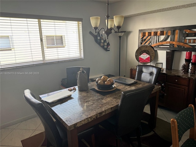 950 SW 104th Ct Unit C-201, Miami, FL 33174 - dining space featuring light tile patterned flooring and a chandelier