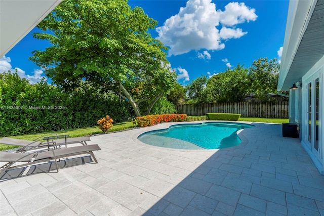 15904 W Wind Cir, Sunrise, FL 33326 - view of swimming pool featuring a patio and a fenced backyard