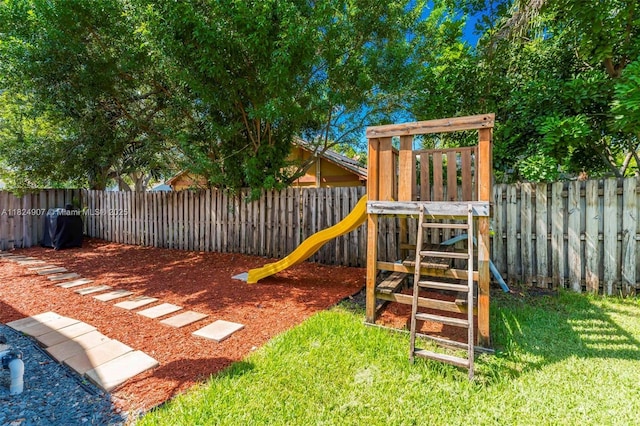 15904 W Wind Cir, Sunrise, FL 33326 - view of playground with a fenced backyard