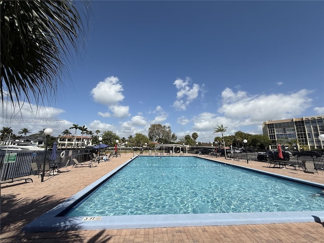 2101 Atlantic Shores Blvd Unit 120, Hallandale Beach, FL 33009 - community pool with a patio area