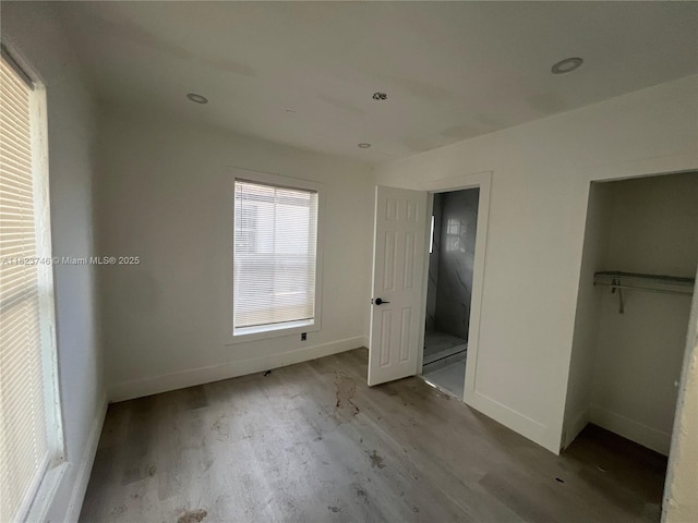 1800 SW 3rd St # B, Miami, FL 33135 - unfurnished bedroom featuring wood finished floors and baseboards