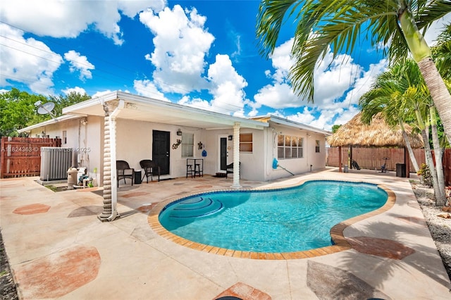 11700 Sheridan St, Pembroke Pines, FL 33026 - view of swimming pool featuring a patio and a fenced backyard