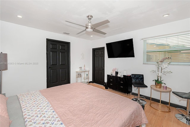 11700 Sheridan St, Pembroke Pines, FL 33026 - bedroom with light wood-type flooring, recessed lighting, and ceiling fan