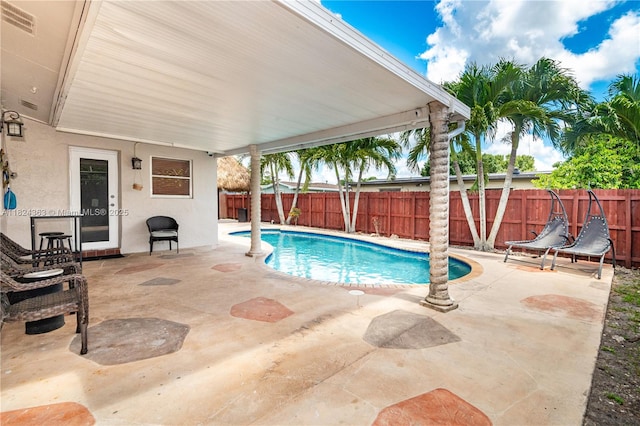 11700 Sheridan St, Pembroke Pines, FL 33026 - view of pool with a patio and a fenced backyard