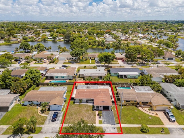 11700 Sheridan St, Pembroke Pines, FL 33026 - aerial view of residential area with property parcel outlined and a nearby body of water