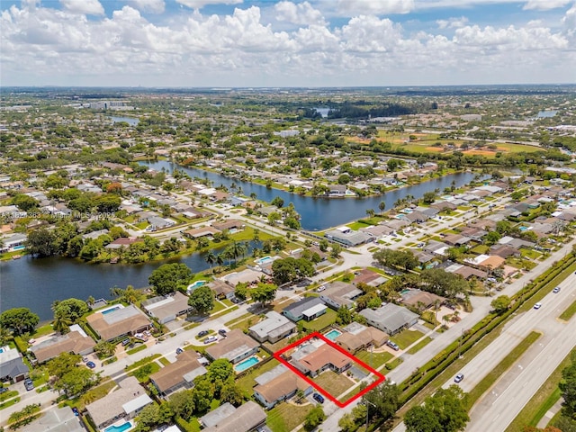 11700 Sheridan St, Pembroke Pines, FL 33026 - aerial view of residential area with property boundaries highlighted and a large body of water