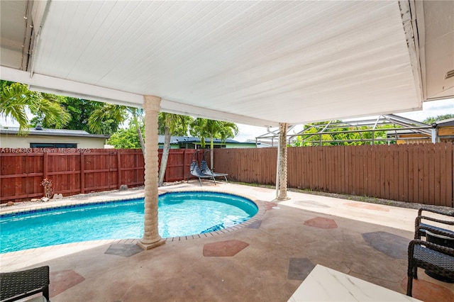 11700 Sheridan St, Pembroke Pines, FL 33026 - view of swimming pool with a patio and a fenced backyard