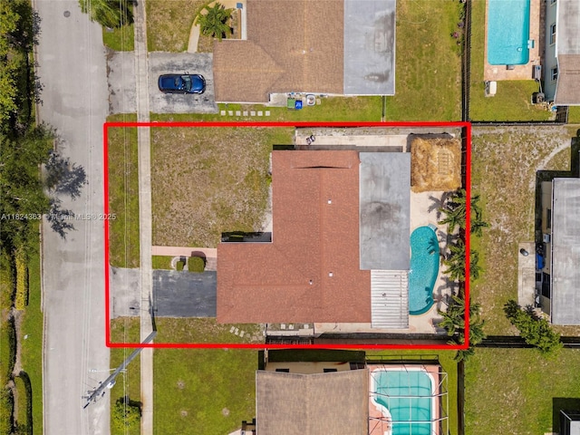 11700 Sheridan St, Pembroke Pines, FL 33026 - aerial view of property and surrounding area with a pool area and property parcel outlined