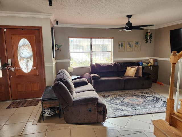 5328 W 26th Ave Unit 112, Hialeah, FL 33016 - tiled living room featuring a ceiling fan, ornamental molding, and a textured ceiling