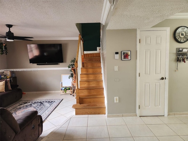 5328 W 26th Ave Unit 112, Hialeah, FL 33016 - living room featuring ceiling fan, light tile patterned floors, a textured ceiling, stairway, and crown molding