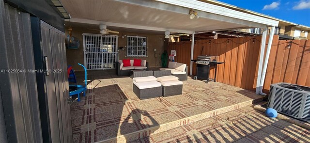5328 W 26th Ave Unit 112, Hialeah, FL 33016 - view of patio with ceiling fan, an outdoor living space, and area for grilling