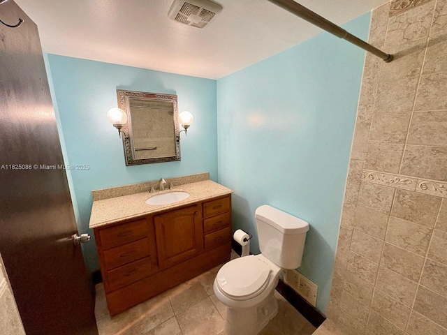 6039 Collins Ave Unit 923, Miami Beach, FL 33140 - full bath with tiled shower, vanity, and tile patterned floors