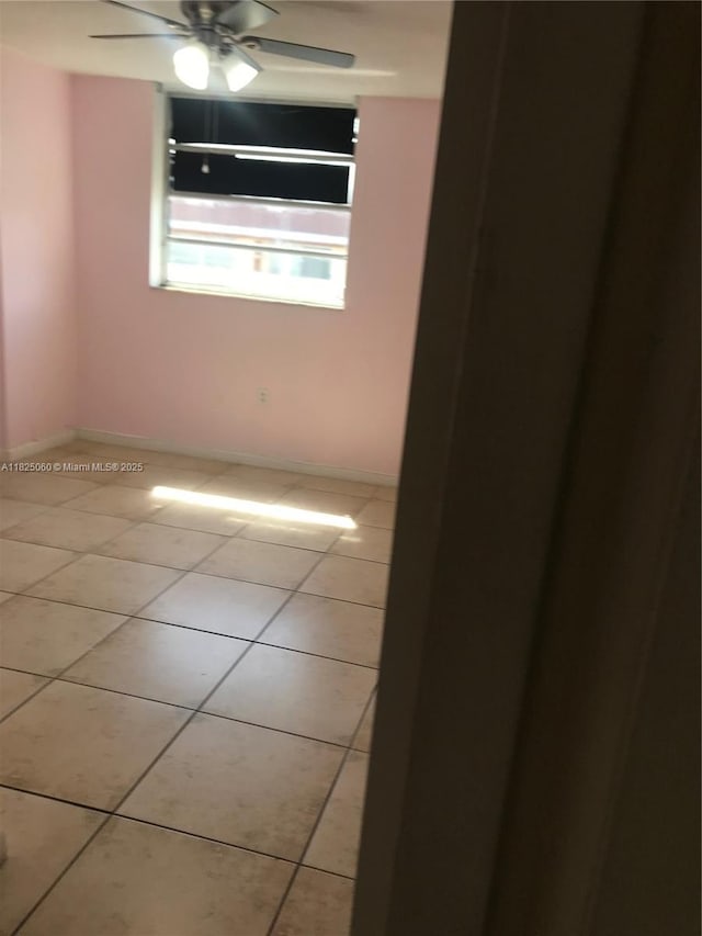 1145 Normandy Dr Unit 304, Miami Beach, FL 33141 - unfurnished room featuring tile patterned floors and a ceiling fan