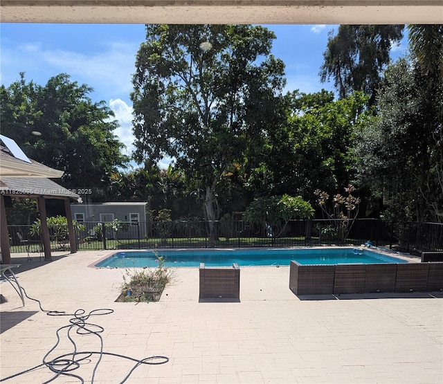 2171 NW 123rd Ave, Plantation, FL 33323 - view of swimming pool with a patio area and view of scattered trees