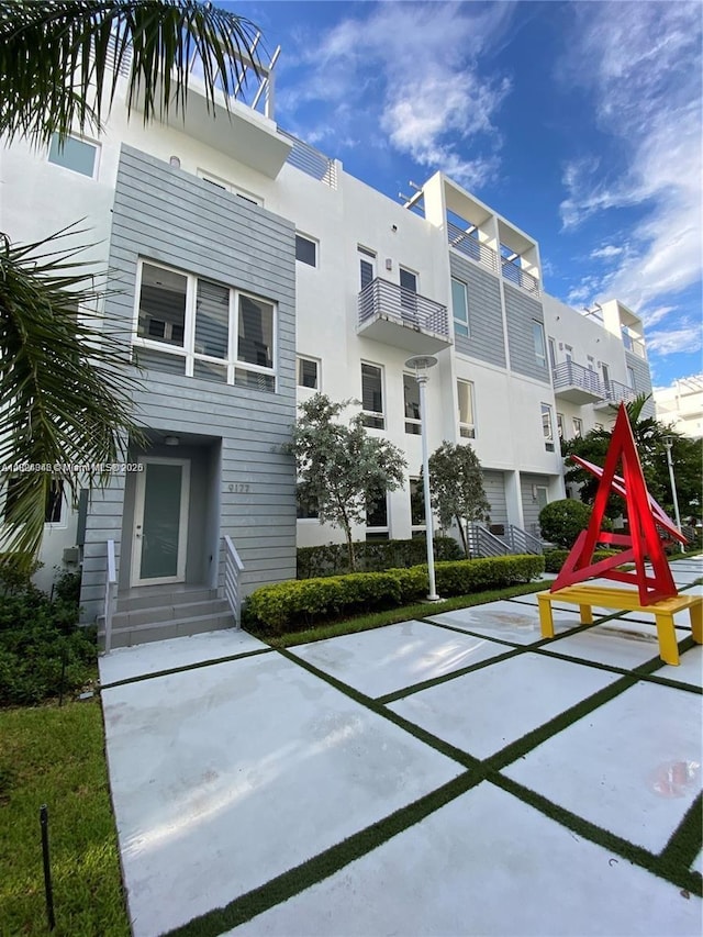 9181 NW 33rd St Unit 9181, Doral, FL 33172 - view of building exterior with entry steps