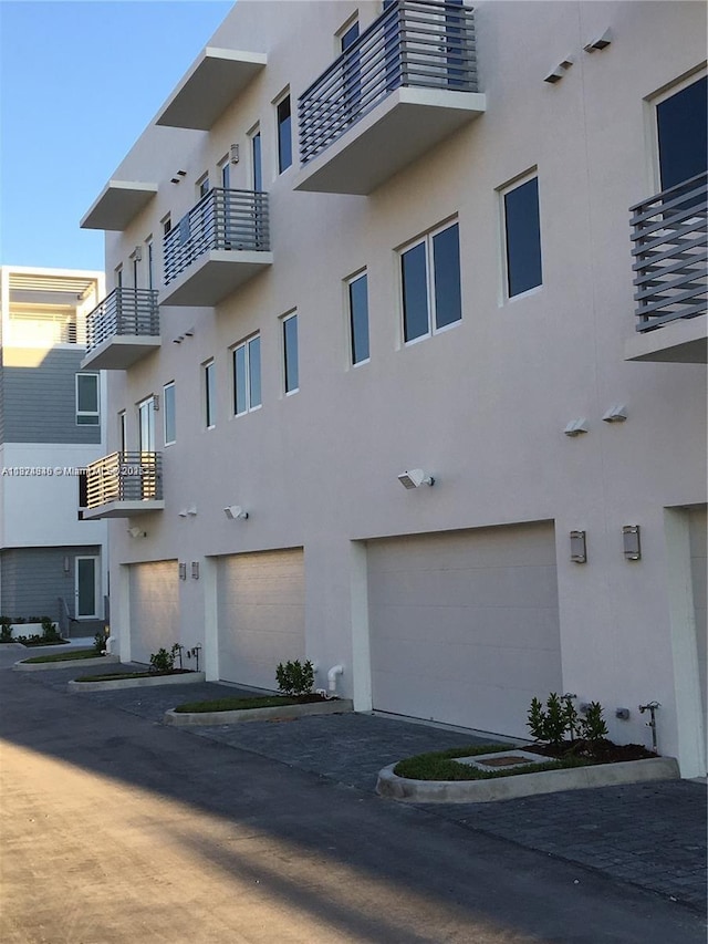 9181 NW 33rd St Unit 9181, Doral, FL 33172 - view of property featuring an attached garage