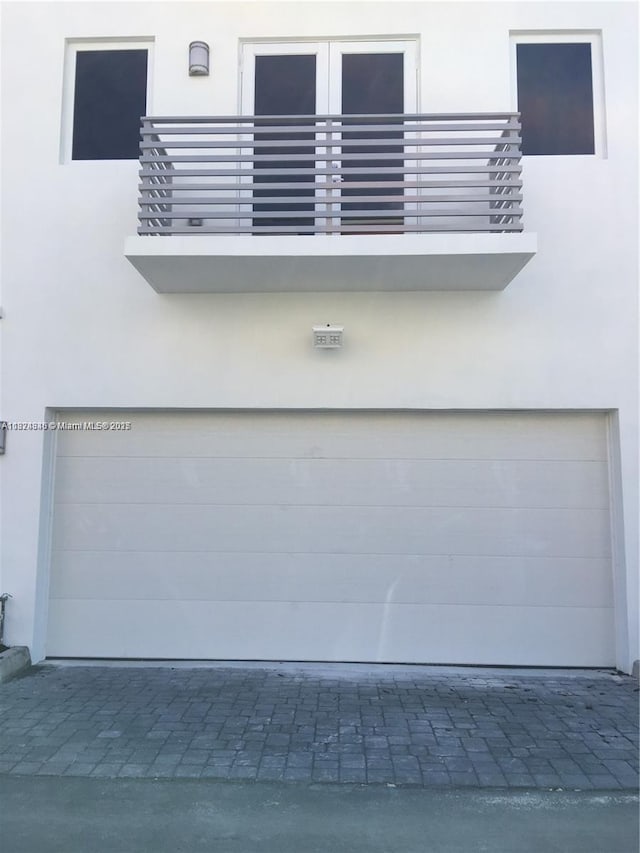 9181 NW 33rd St Unit 9181, Doral, FL 33172 - garage featuring decorative driveway