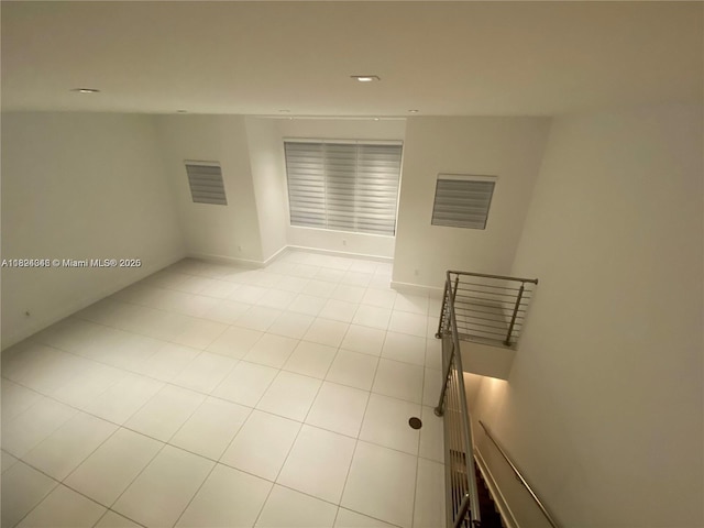9181 NW 33rd St Unit 9181, Doral, FL 33172 - unfurnished room with light tile patterned floors and recessed lighting