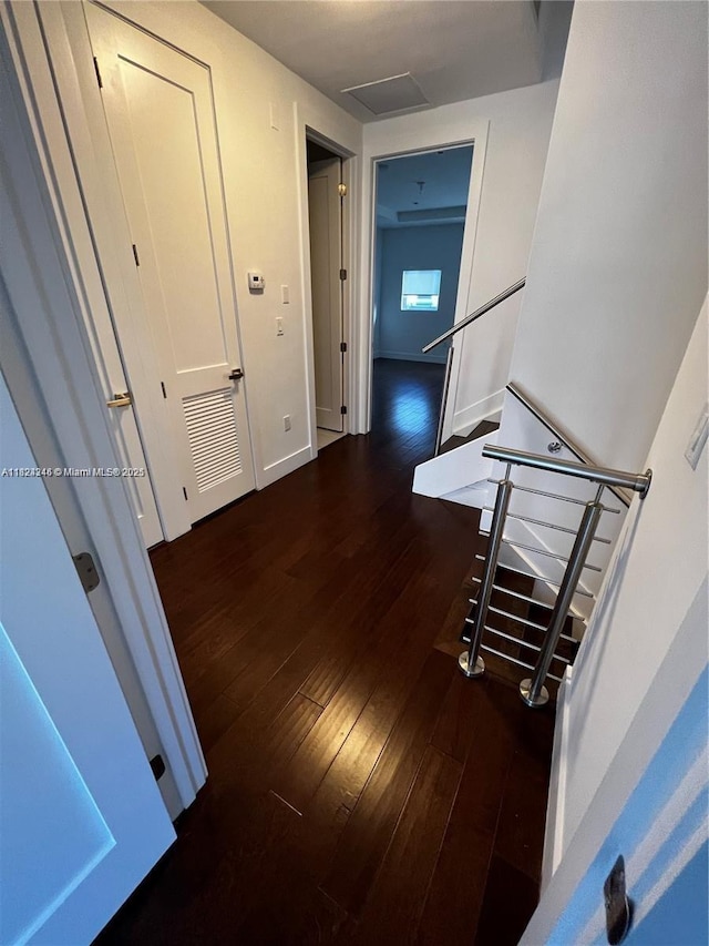 9181 NW 33rd St Unit 9181, Doral, FL 33172 - hallway with hardwood / wood-style flooring and attic access