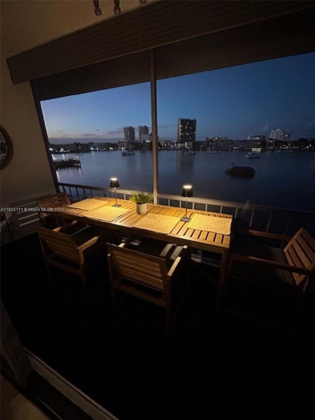 300 Golden Isles Dr Unit 311, Hallandale Beach, FL 33009 - dock area with a balcony, a water view, and a view of city