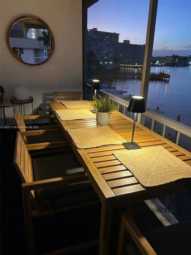 300 Golden Isles Dr Unit 311, Hallandale Beach, FL 33009 - balcony featuring a water view and a dock