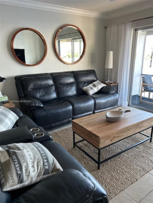 300 Golden Isles Dr Unit 311, Hallandale Beach, FL 33009 - living area featuring ornamental molding and tile patterned flooring