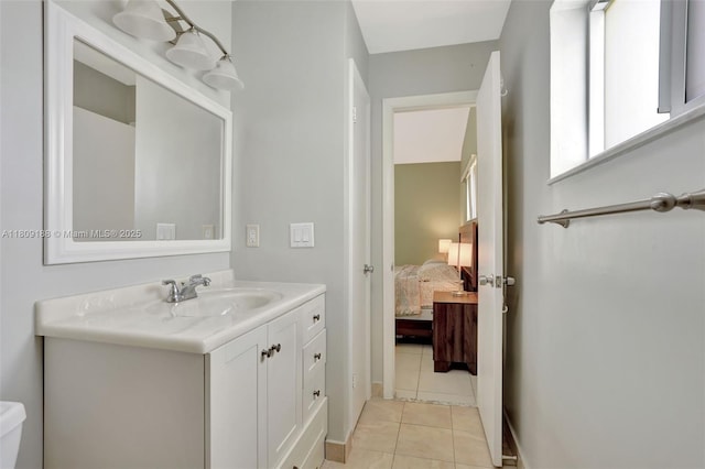 453 Lakewood Cir Unit A, Margate, FL 33063 - bathroom with vanity, tile patterned floors, and ensuite bathroom