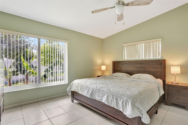 453 Lakewood Cir Unit A, Margate, FL 33063 - tiled bedroom featuring vaulted ceiling and a ceiling fan