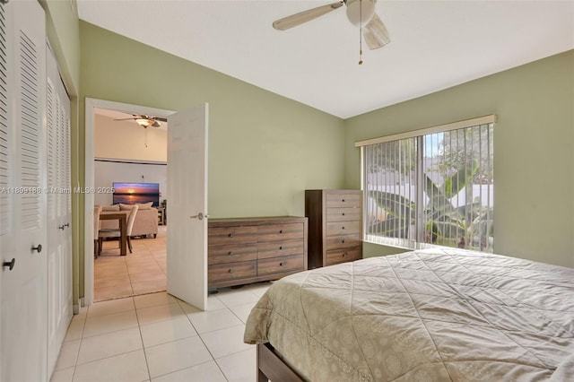 453 Lakewood Cir Unit A, Margate, FL 33063 - tiled bedroom with lofted ceiling, ceiling fan, and a closet