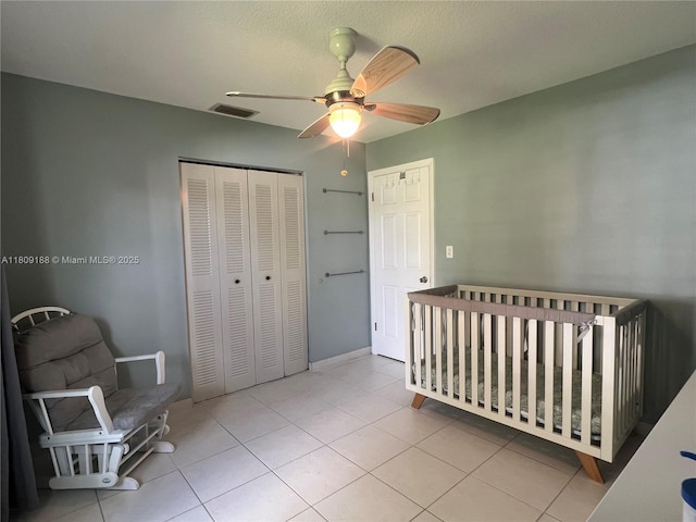453 Lakewood Cir Unit A, Margate, FL 33063 - tiled bedroom with a closet, a ceiling fan, and a nursery area