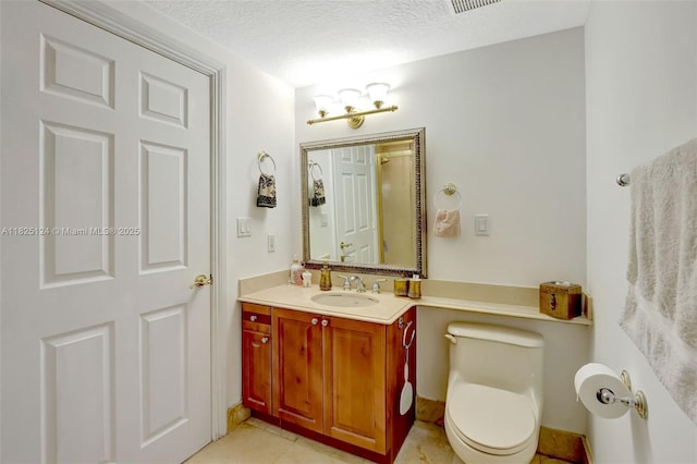 322 Madeira Ave Unit 402, Coral Gables, FL 33134 - full bathroom with vanity, tile patterned floors, and a textured ceiling