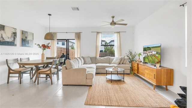25564 SW 108th Ave, Homestead, FL 33032 - living room featuring light tile patterned floors and a ceiling fan