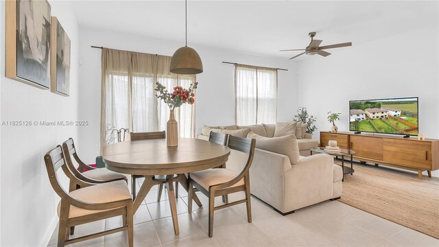 25564 SW 108th Ave, Homestead, FL 33032 - dining room with a ceiling fan and light tile patterned floors