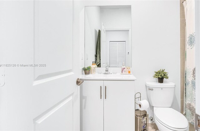 25564 SW 108th Ave, Homestead, FL 33032 - bathroom with vanity and curtained shower
