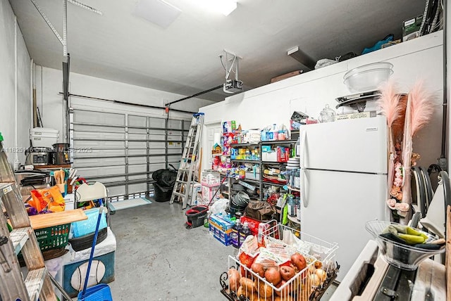 3521 Forest View Cir, Dania Beach, FL 33312 - garage with freestanding refrigerator and a garage door opener