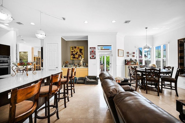 3521 Forest View Cir, Dania Beach, FL 33312 - living area with ornamental molding, light tile patterned floors, plenty of natural light, and recessed lighting