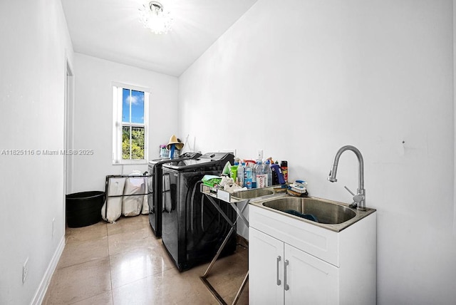 3521 Forest View Cir, Dania Beach, FL 33312 - washroom featuring washing machine and dryer and cabinet space