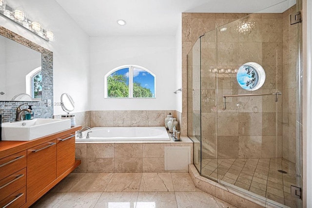 3521 Forest View Cir, Dania Beach, FL 33312 - bathroom with vanity, a bath, a stall shower, and recessed lighting
